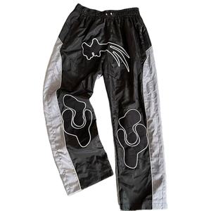 Pantalones de chándal de nailon transpirables Unisex personalizados, ropa de calle holgada de pierna ancha ajustable, diseño bordado, cortavientos, características - Product Image 1