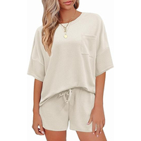 Ensemble 2 pièces en tricot gaufré pour femmes, haut à manches courtes à col rond avec poche, short assorti, coupe ample décontractée, vêtements de printemps et d'été
