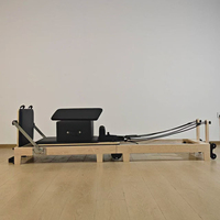 Lit de Pilates professionnel pliable en bois beige sur mesure pour usage commercial – Vente directe usine