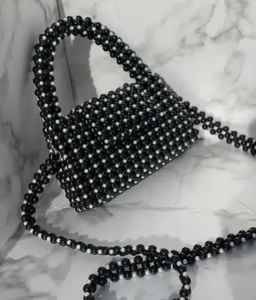 กระเป๋าคลัทช์ปักลูกปัดเรซิ่นสีดำ งานฝีมือประณีต ลวดลายดอกไม้ กระเป๋าถือผู้หญิง>กระเป๋าถือ - Product Image 1