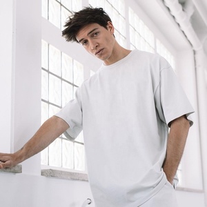 Ensemble de survêtement en coton blanc pour hommes, manches courtes, col rond, couleur unie, décontracté, short d'été, coupe ample, léger et respirant - Product Image 3