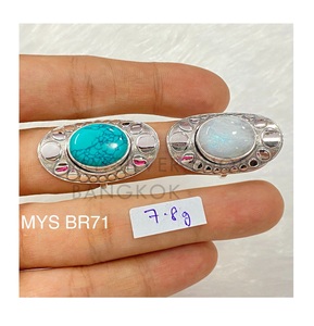 แหวนเงินแท้ 925 ดีไซน์โดดเด่น ประดับด้วยพลอยเทอร์ควอยซ์ทรงรีธรรมชาติ และพลอยมูนสโตนสีรุ้งแบบฝังขอบ ขายส่ง - Product Image 2