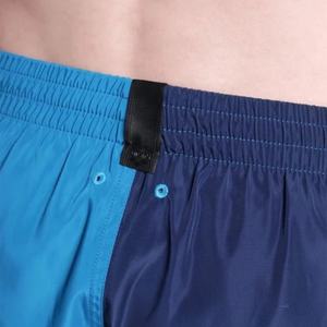 กางเกงว่ายน้ำขาสั้นสองสีสำหรับผู้ชายกางเกงขาสั้นชายหาดผ้าแห้งเร็วน้ำหนักเบามีเชือกผูกปรับได้โลโก้ได้ตามต้องการ - Product Image 3