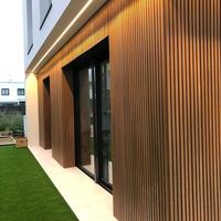 Panneau composite intérieur en bois plastique imperméable Panneau mural 3D en WPC Panneau de plafond cannelé en WPC
