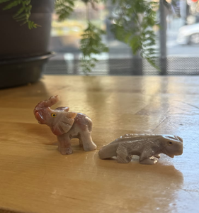 Pair of tiny hand-carved stone <b>miniatures</b> featuring an elephant and a crocodile, available at wholesale prices. - Product Image 1