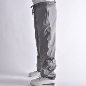Pantalones de Nieve Grises para Exteriores con Exterior Impermeable, Corte Holgado y Cintura Ajustable con Cordón para Deportes de Invierno - Product Image 1