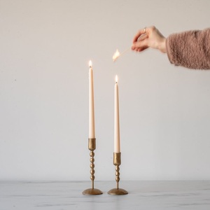 Refined <b>brass</b> candle <b>holder</b> designed for sophisticated decorative settings with artisan quality and enduring household beauty - Product Image 1