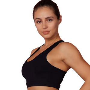 Sujetador deportivo acolchado transpirable para mujer con diseño de logo personalizado, soporte medio, espalda cruzada, 100% nailon, tipo top de yoga - Product Image 1