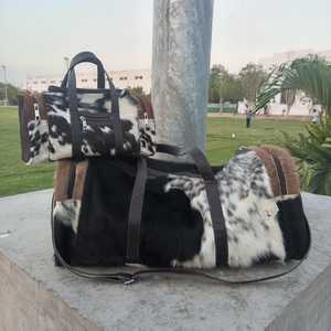 กระเป๋าเดินทางหนังแท้คุณภาพพรีเมียม หนังวัว  แบบถือหรือสะพาย  สำหรับเดินทางช่วงสุดสัปดาห์  รับผลิตตามแบบ (OEM) สำหรับส่งออกจำนวนมาก รุ่น LHTB-0105 - Product Image 4