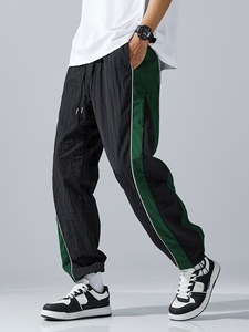 กางเกงพาราชูททรงหลวมขาบานสีขาวดำแบบสั่งทำพิเศษสำหรับผู้ชาย สไตล์สตรีทแฟชั่น - รองรับ OEM/ODM อย่างเต็มรูปแบบ - Product Image 4