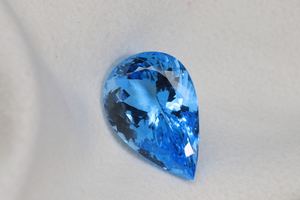 พลอยบลูโทแพซสวิสสวยงาม - พลอยบลูโทแพซสวิสทรงลูกแพร์ขนาด 12x8 มม. - พลอยบลูโทแพซสวิสแบบเม็ดเดี่ยวราคาขายส่ง - Product Image 3