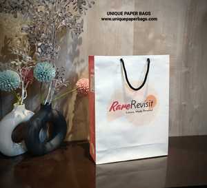 Luxury Custom Printed White <b>Paper</b> Gift Bag with Black Rope Handle Premium Retail Boutique and Cosmetic Packaging - Product Image 1