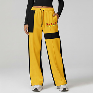 Pantalones de chándal anchos para mujer, amarillos y negros, de cintura alta con cordón, ajuste holgado, estilo hip hop, joggers de calle, pantalones largos de forro polar - Product Image 1