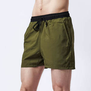 กางเกงขาสั้นผ้าแคนวาสแบบผูกเชือกสำหรับผู้ชายกางเกงขาสั้นผ้าฝ้าย100% แบบหลวมลายกรดซักในฤดูร้อนออกแบบได้ตามต้องการ - Product Image 3