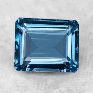 พลอยโทแพซสีน้ำเงินลอนดอนธรรมชาติ ทรงเหลี่ยมมรกต  ความใสสูง  รับรองโดย GIA และ IGI สำหรับขายส่งเครื่องประดับ - Product Image 1