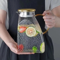 Vente en gros de carafes à eau en verre borosilicate de haute qualité personnalisées de 1500 ml et 1800 ml avec couvercle en métal pour le thé et le café