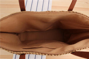 Upgrade your accessory collection with this premium Natural yarn bag designed with a classic open <b>top</b> and slender leather handle - Product Image 3