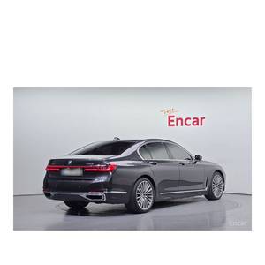 BMW Série 7 730d XDrive Mai 2020 76 783 km Diesel Boîte Automatique Sièges en Cuir Conduite à Gauche Design Pure Excellence Arrière - Product Image 2