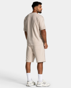 ชุดฤดูร้อนสีพื้นใส่สบายสำหรับผู้ชาย เสื้อยืดผ้าฝ้ายสั่งทำ กางเกงขาสั้นผ้าเจอร์ซีย์ ป้องกันขนร่วง ทรงหลวมไหล่ตก - Product Image 1