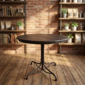 Mesa de Centro Redonda Rústica de Hierro con Superficie de Metal Negro Texturizado y Base de Pedestal Curvo - Product Image 5