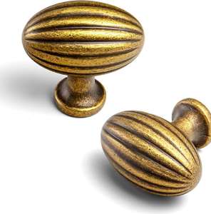 Paire de poignées ovales en laiton pour armoires ou portes, avec textures côtelées horizontales, disponibles à prix de gros - Product Image 1