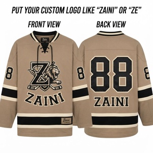 เสื้อฮอกกี้น้ำแข็งโพลีเอสเตอร์พรีเมียม 220 GSM สีเบจ ดีไซน์แผงสีดำ ปักชื่อและหมายเลขแบบกำหนดเอง แขนสั้น - Product Image 1