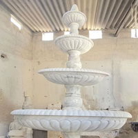 Fontaine de jardin classique en marbre blanc au design moderne, écologique, résistante à l'eau et durable pour l'aménagement paysager des hôtels et des complexes hôteliers