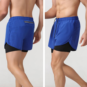Shorts de compression pour homme, couleur unie, avec poches, séchage rapide, taille élastique, longueur mi-cuisse, en spandex et polyester, design tricoté - Product Image 2