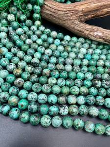 ลูกปัดหินเทอร์ควอยซ์แอฟริกันธรรมชาติทรงกลม สีเขียวฟ้าสวยงาม ประดับด้วยจุดสีดำ สำหรับทำเครื่องประดับ - Product Image 3