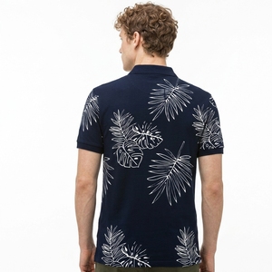 เสื้อโปโลแขนสั้นสีน้ำเงินกรมท่าสำหรับผู้ชาย พิมพ์ลายใบไม้เขตร้อนสีขาวด้วยเทคนิค Sublimation ผ้าฝ้ายอ๊อกซ์ฟอร์ดแบบลำลอง ระบายอากาศได้ดี - Product Image 4