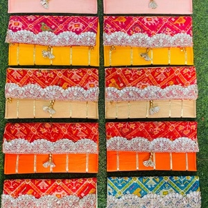 Celebrate timeless Indian craftsmanship with this vibrant handcrafted Patola inspired <b>envelope</b> clutch set - Product Image 1
