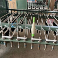 Machine à enrouler le fil textile pour l'enroulement du fil de trame du métier à tisser à navette Enrouleur de fil de trame