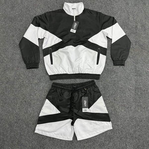 Ensemble de survêtement unisexe coupe-vent color block à séchage rapide avec veste demi-zip et short de sport - Product Image 4