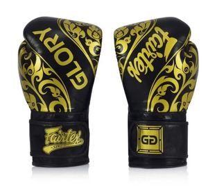 นวมชกมวย Fairtex Professional Black Gold รุ่นน้ำหนักเบา สำหรับผู้ใหญ่ แบบ unisex  วัสดุหนัง  พร้อมสายรัดแบบ Hook Loop ระบายอากาศได้ดี เหมาะสำหรับการฝึกซ้อมและการต่อสู้ - Product Image 1