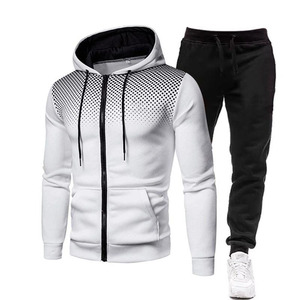 Men's premium performance tracksuits. Sleek athletic <b>sets</b> featuring full-zip hoodies with <b>matching</b> <b>joggers</b>. - Product Image 1