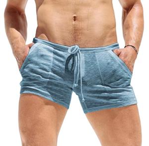 Pantalones Cortos Casuales para Hombre, de Color Sólido, Tejido Satinado de Poliéster, con Logotipo Frontal, Cordón Ajustable, Cintura Media, Transpirables, con Bolsillos - Product Image 1
