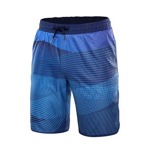 Short de bain décontracté pour homme, bleu uni, respirant, séchage rapide, taille à cordon de serrage, longueur courte, taille mi-haute, en coton non tissé - Product Image 1