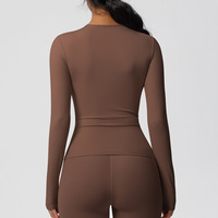 T-shirt de sport pour femme à manches longues, très élastique, couleur unie, design brossé, pour entraînement, course, fitness, yoga, grande taille, avec bouton
