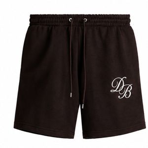 Shorts de sport décontractés en molleton épais pour homme, noirs, avec cordon de serrage et logo brodé, fabricant OEM ODM - Product Image 1
