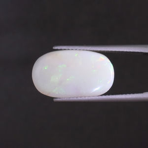 โอปอลธรรมชาติสีขาวรับรองโดย IGI น้ำหนัก 5.01 กะรัต รูปทรงคุชชั่น ขนาด 18.5x11.5 มม. ขัดเจียระไนด้วยมือ ผ่านการเคลือบแว็กซ์/น้ำมัน - Product Image 1