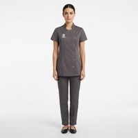 Ensemble uniforme de tunique d'esthéticienne personnalisé avec logo pour femme, col montant, haut à manches courtes, pantalon ajusté, tenue de travail tricotée pour spa et salon