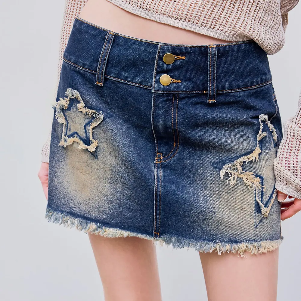 WS175 Mini saia jeans feminina personalizada de cintura baixa com estrela e borla micro saia