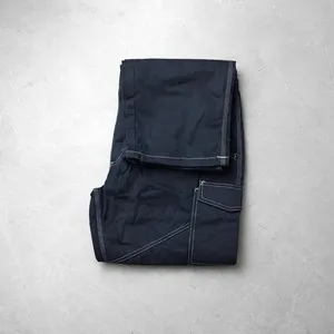 Pantalon de travail unisexe haute visibilité avec surpiqûres contrastées blanches et poches latérales - Product Image 3