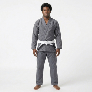 Uniforme de Taekwondo de haute qualité, 100% coton, tissu respirant et écologique, coupe confortable, léger - Product Image 1