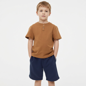 Boys Short Sleeve Cotton <b>Henley</b> T-<b>Shirt</b> Solid Color Casual Polo Top Brown Navy Blue Shorts White Shoes Set made in Bangladesh - Product Image 2