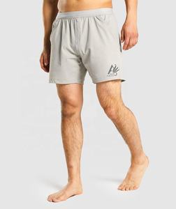 Gran oferta de pantalones cortos deportivos para hombre, pantalones cortos de entrenamiento de gimnasio de secado rápido con bolsillo, patrón sólido teñido liso, estilo informal ecológico - Product Image 1