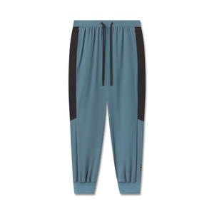 Pantalones de hombre azules con cintura elástica, cordón lateral con rayas, estilo casual, transpirables, de spandex y poliéster, para otoño. - Product Image 1