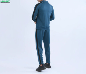 Conjunto de chándal de lujo de punto acanalado para hombre: Top elegante de manga larga y pantalón suave, cómodo y acogedor para el día a día. - Product Image 2