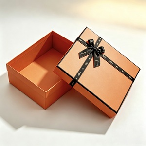 Cajas de Regalo Rígidas Color Naranja, Forma Rectangular con Cinta Negra, Impresión UV, Empaque de Papel de Alta Gama - Product Image 4
