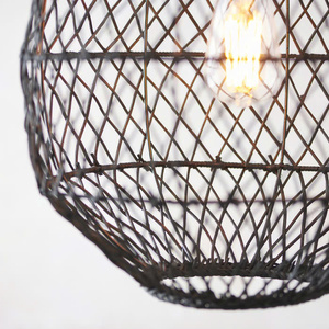 Black, teardrop-shaped lampshade woven from natural rattan, a decorative pendant lamp for home interiors, - Product Image 3